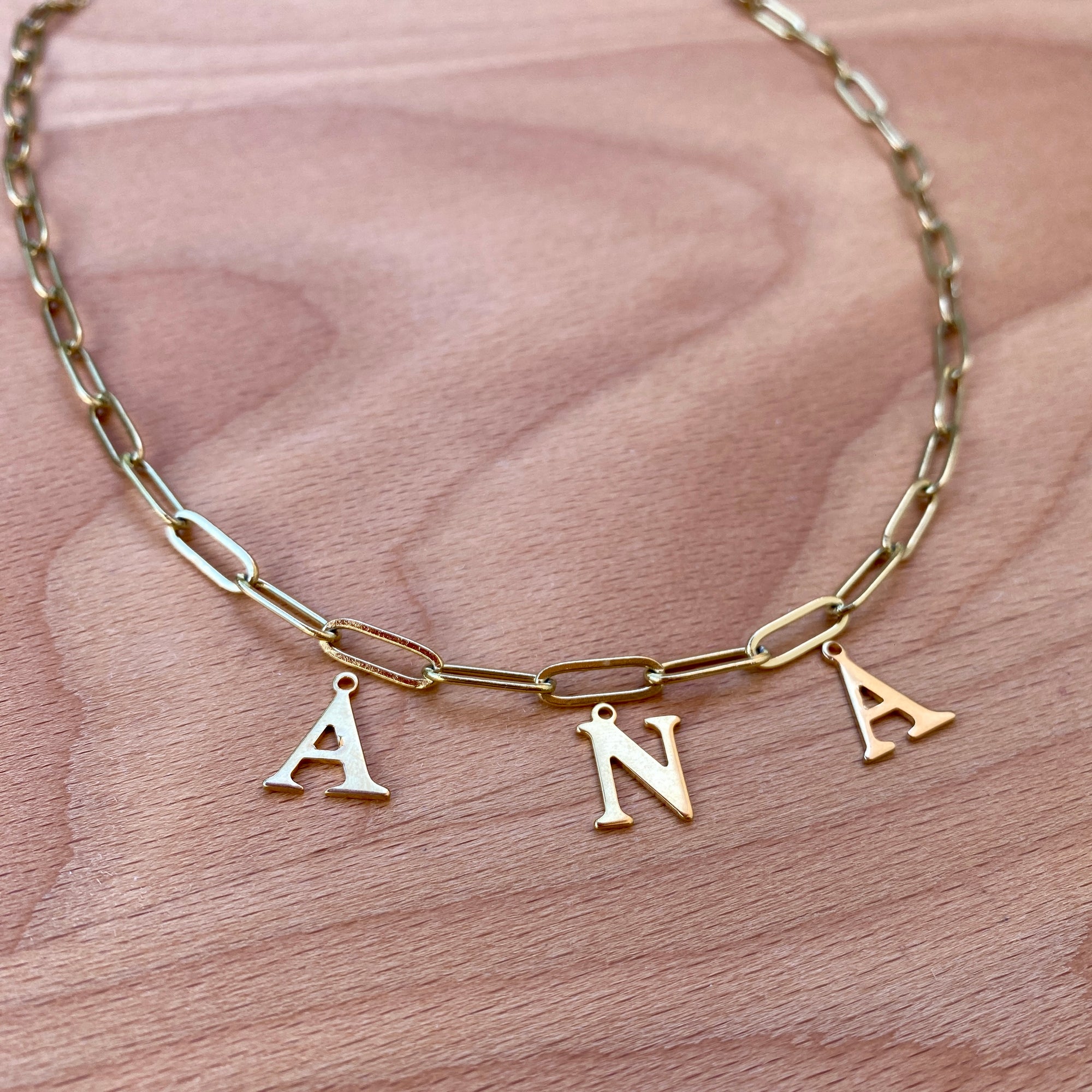 collier initiale acier inoxydable